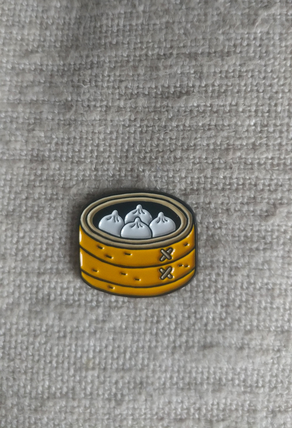 Soup dumplings enamel pin badge.